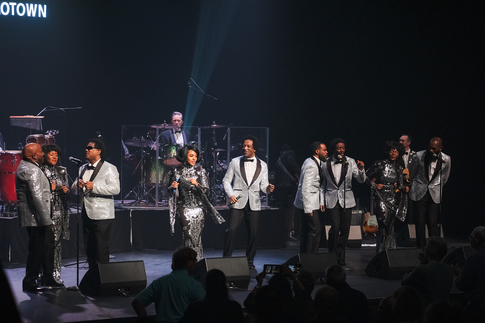 Legends of Motown ensemble in silver stage costumes, an archive performance photo from the official show website; not the Burlington event poster.